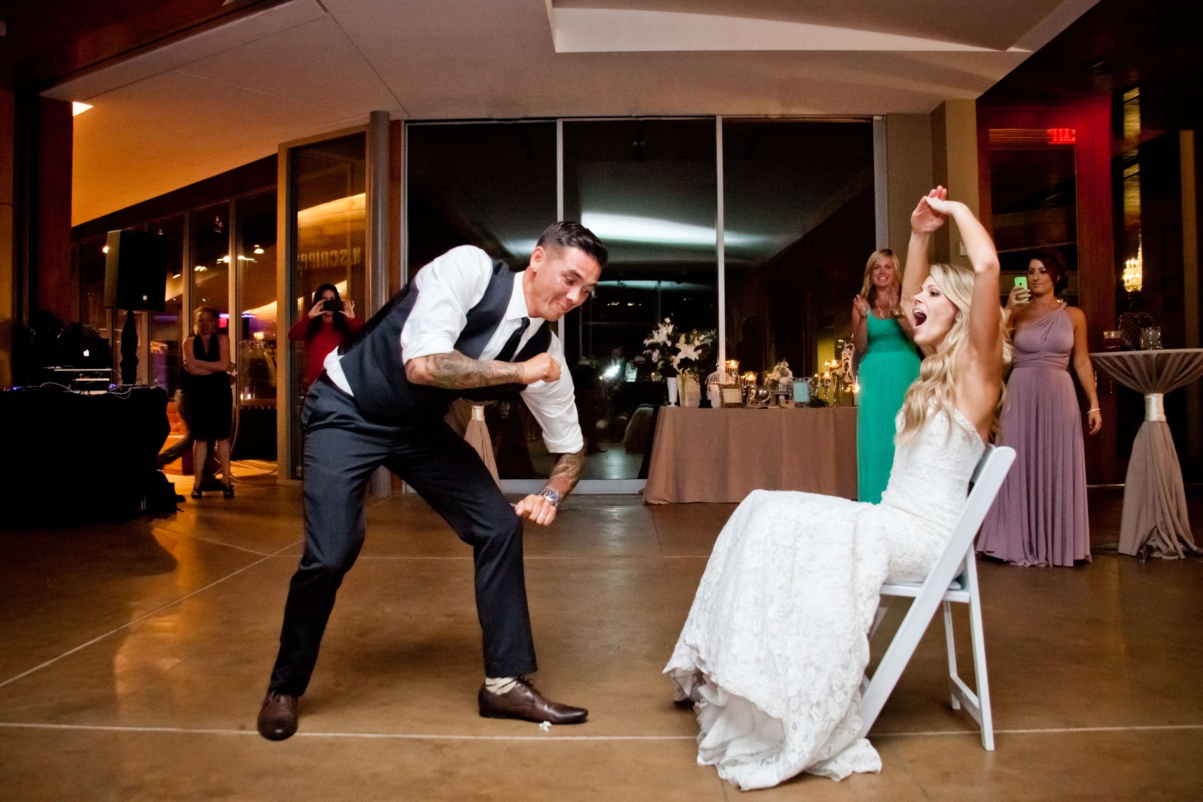 Bouquet and Garter Toss at Scripps Seaside Forum Wedding coordinated by Carmin Designs, Kelly and Jodie Wedding Photo #50 by True Photography