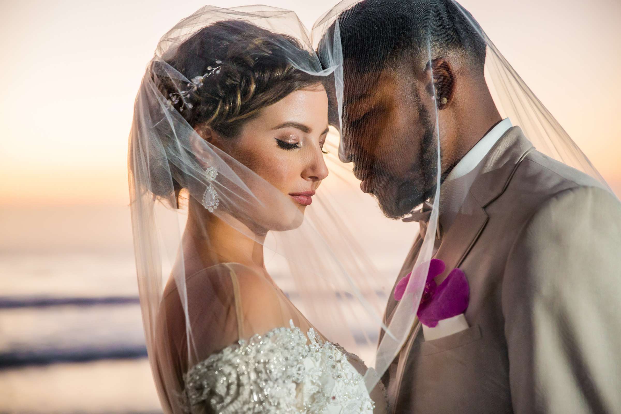 Romantic moment, Veil, Sunset, Photographers Favorite at Scripps Seaside Forum Wedding coordinated by Lavish Weddings, Nicole and Brandon Wedding Photo #1 by True Photography