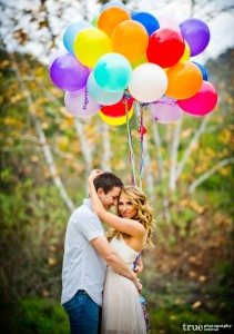 San Diego Wedding Photography: Engagement shoot in a field with bright colored balloons