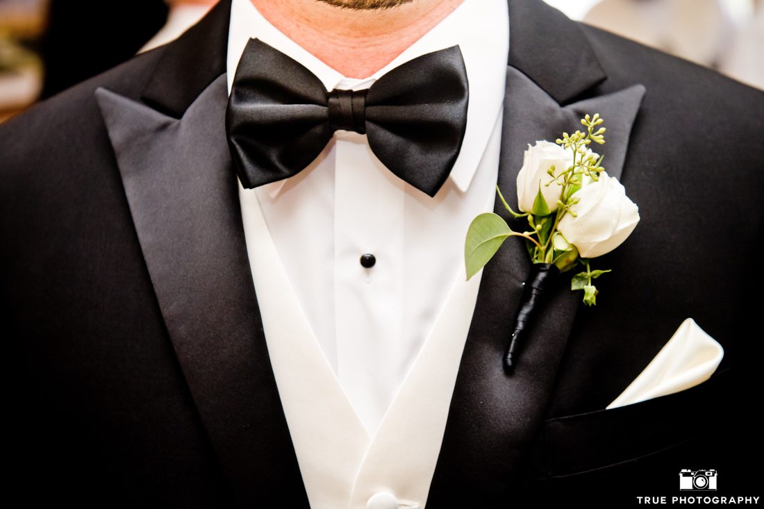 Close-up of a black tuxedo and bowtie