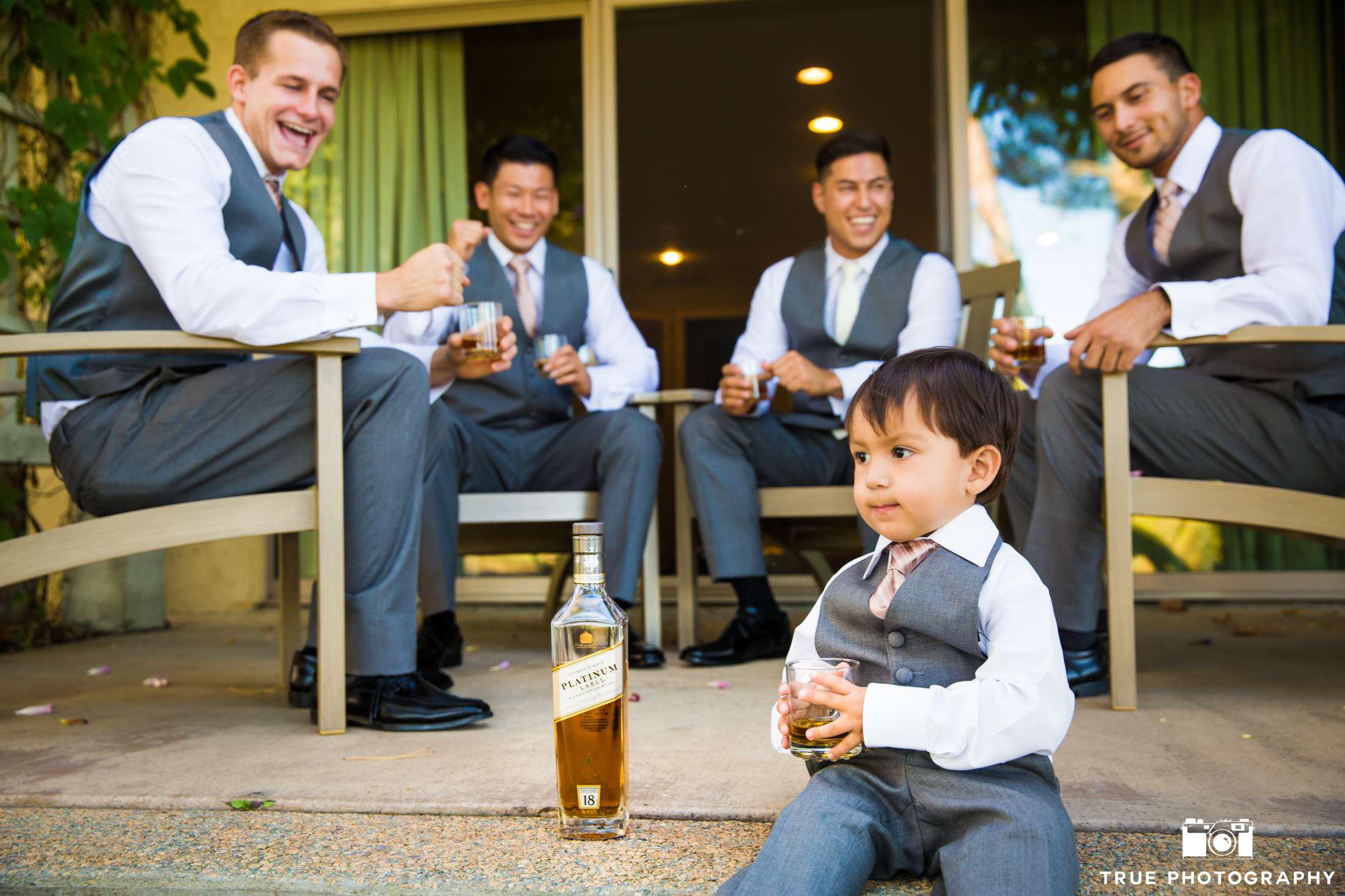 ring bearer with pretend whiskey