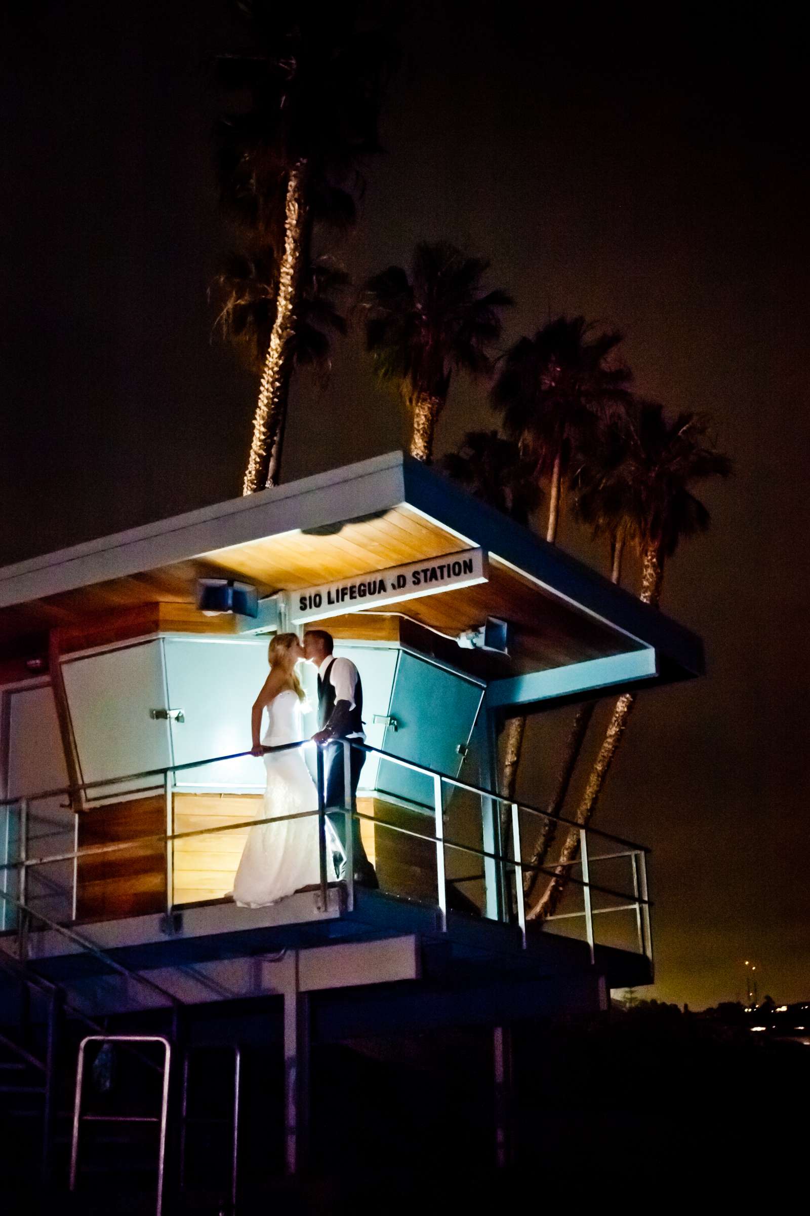 Romantic moment at Scripps Seaside Forum Wedding coordinated by Carmin Designs, Kelly and Jodie Wedding Photo #5 by True Photography